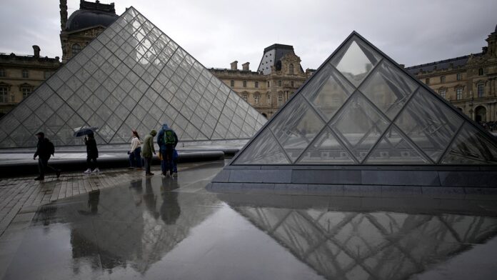 1761828152_louvre-museum-courtyard-paris-france.jpg