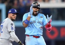 Vladimir Guerrero Jr wears Marie-Phillp Poulin jersey before World Series