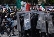 Mexico City protesters attack police in violent anti-government march
