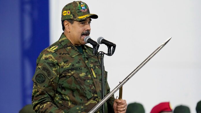 1764349120_nicolas-maduro-sword-1.jpg