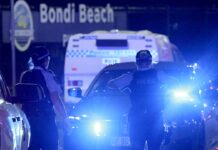 Surviving alleged shooter in Australia attack slapped with charges