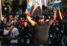Paramilitary groups on motorcycles move to enforce crackdown in Venezuela