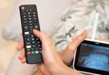 Mum watches baby sleeping on monitor and spots unexpected guest