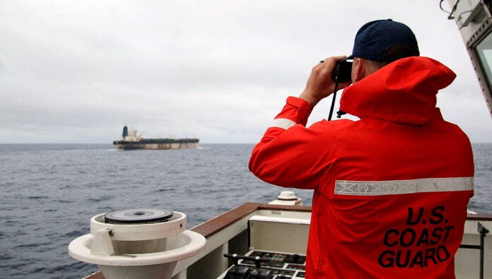 coast-guard-with-binoculars.jpg